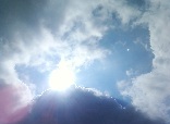 Sun and thundercloud photo